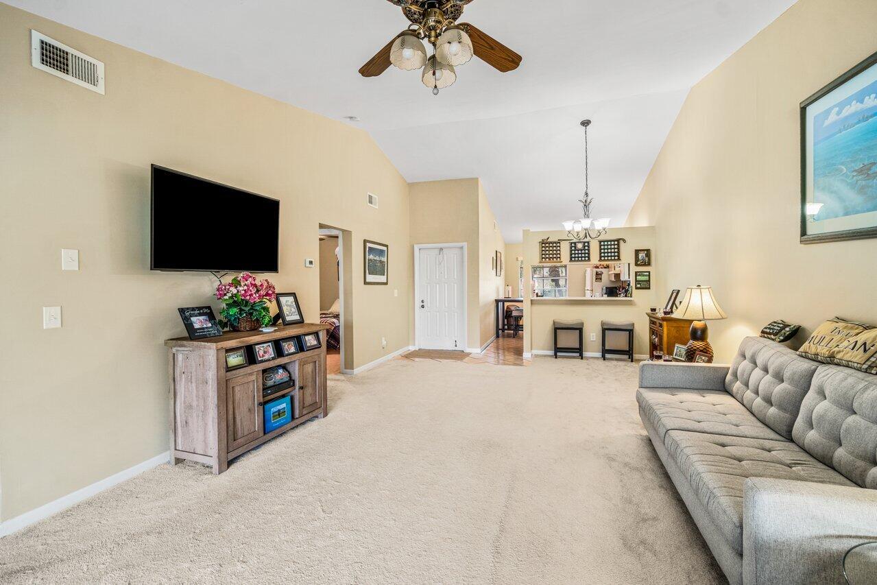 130 Moccasin Trail South Jupiter, FL 33458 - Photo 4 of 29 Living Room Dining Room
