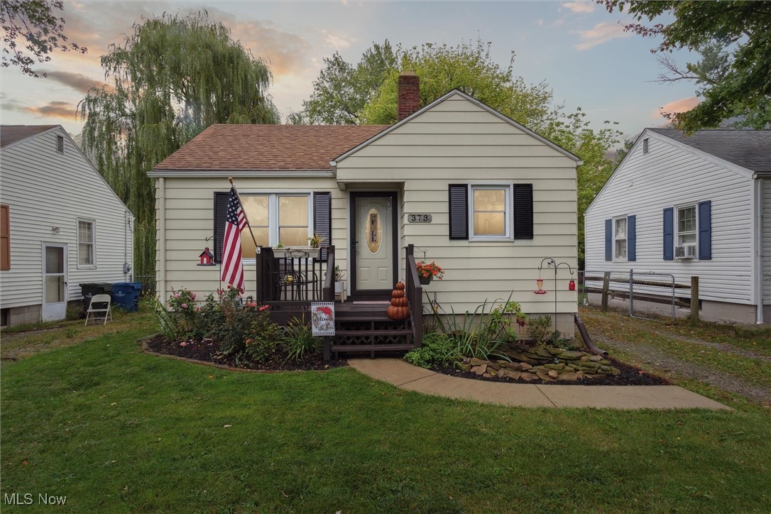 373 Erie Road Vermilion, OH 44089 - Photo 1 of 29 Ranch-style house featuring a lawn
