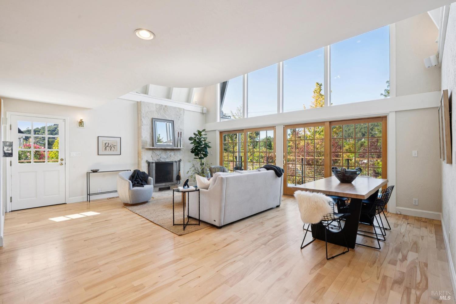 347 Jewell Street San Rafael, CA 94901 - Photo 25 of 61 a living room with fireplace furniture and a wooden floor