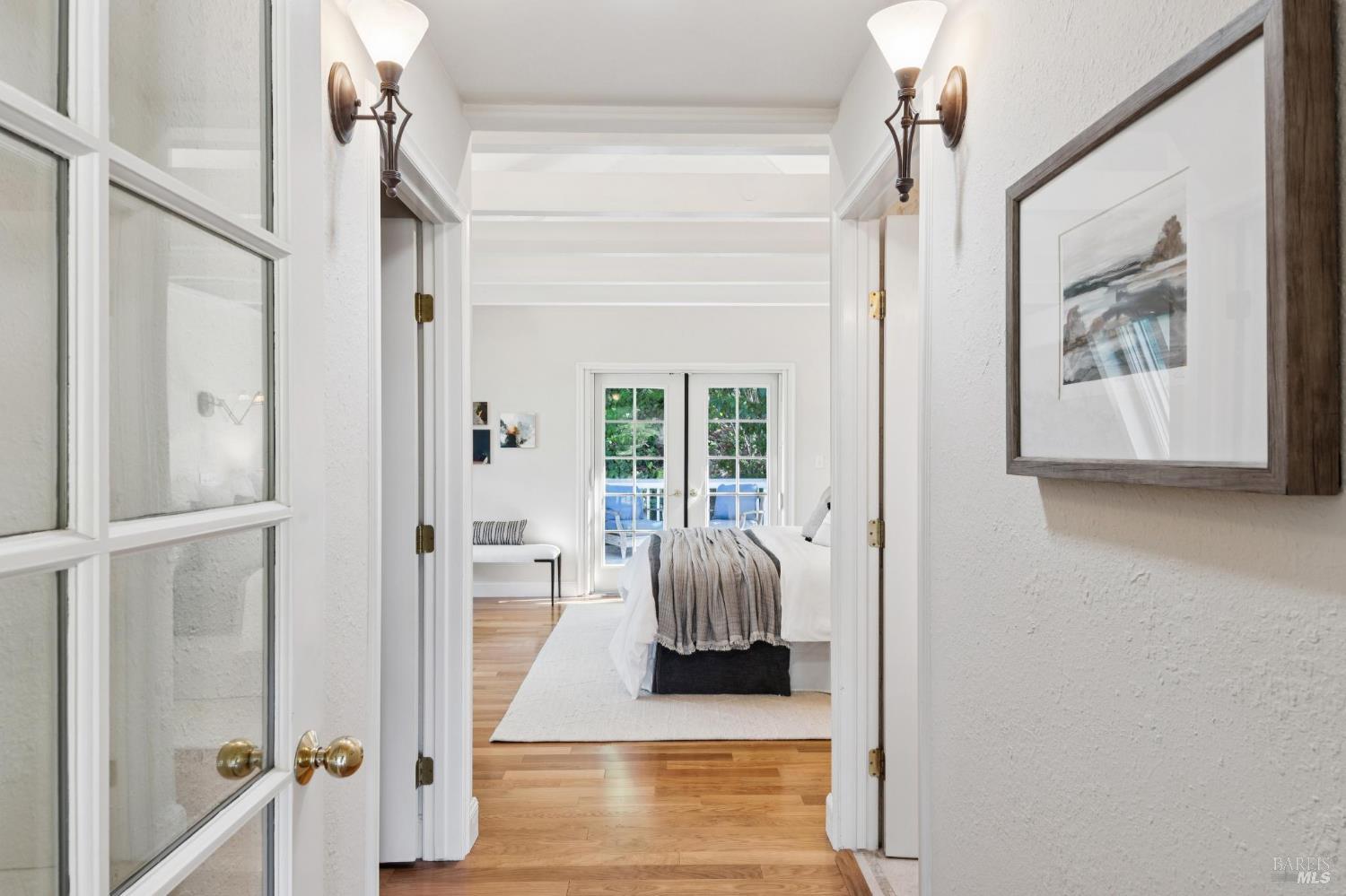 347 Jewell Street San Rafael, CA 94901 - Photo 43 of 61 a view of a hallway with wooden floor and windows