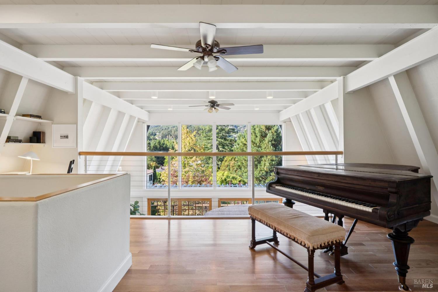 347 Jewell Street San Rafael, CA 94901 - Photo 52 of 61 a living room with a table chairs and a large window
