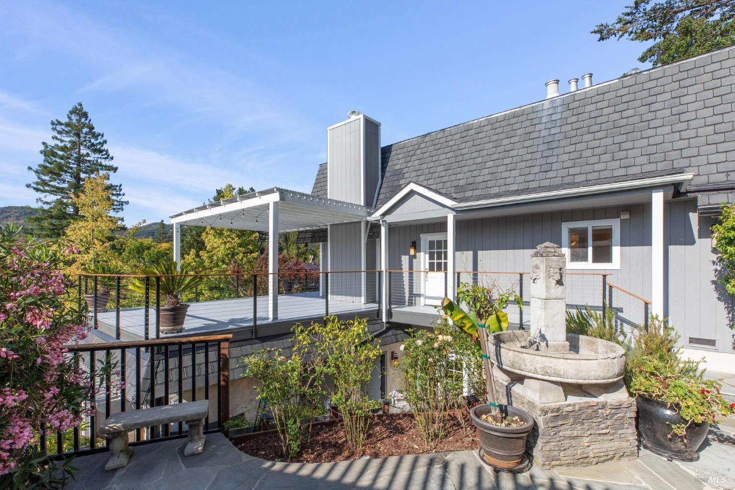 347 Jewell Street San Rafael, CA 94901 - Photo 9 of 61 a view of a house with sitting area and garden