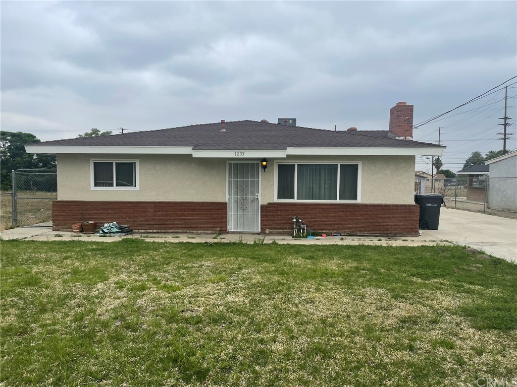 a house view with a garden space