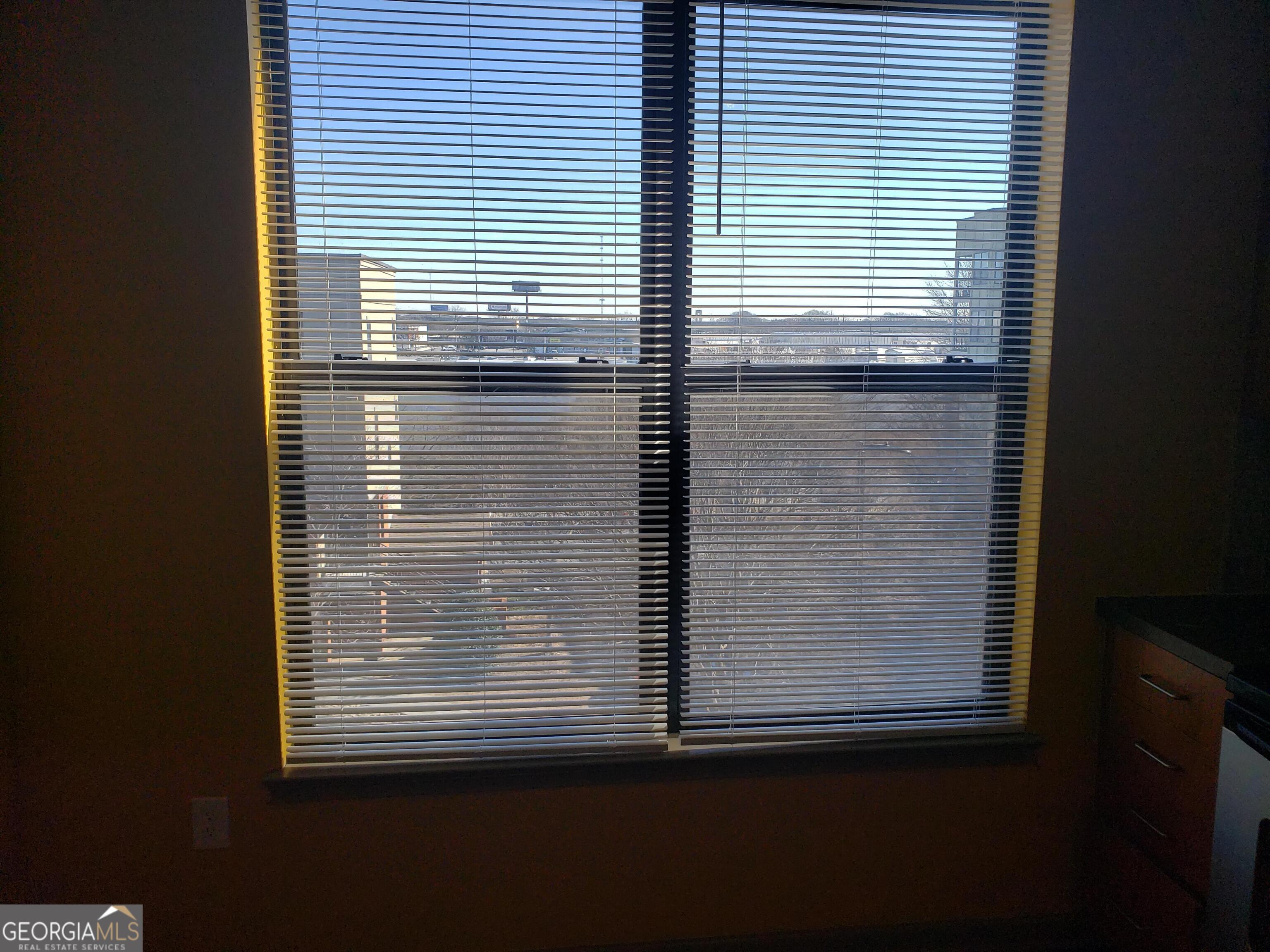 898 Oak Street Southwest, Unit 1303 Atlanta, GA 30310 - Photo 14 of 17 a view of a window in an empty room