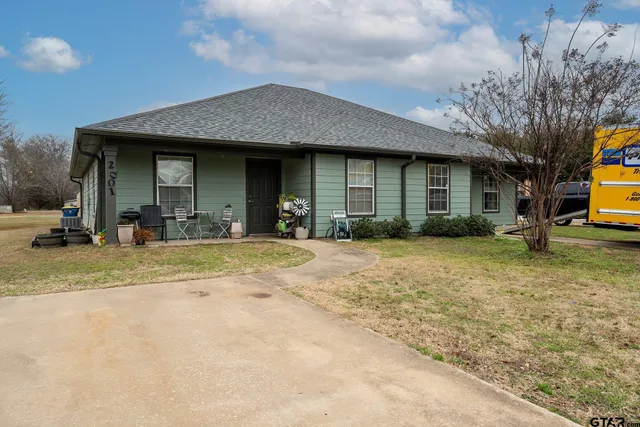 a view of a house with a patio