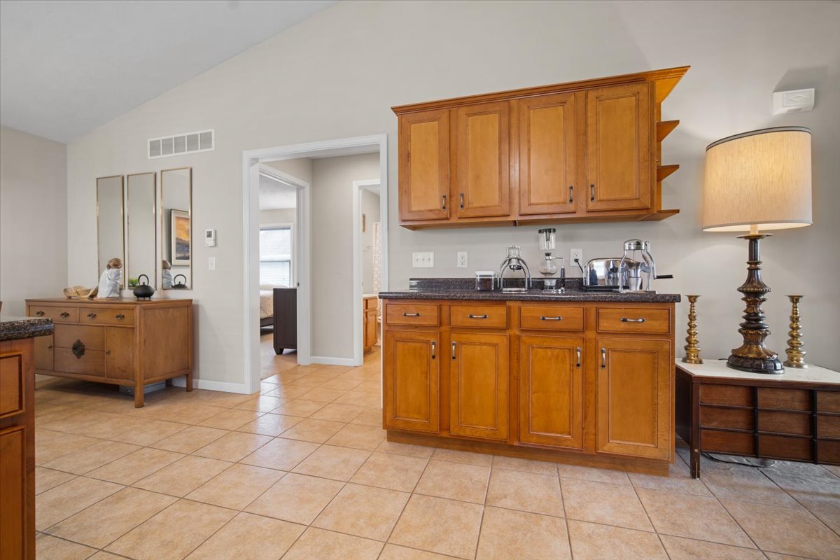 1600 Belclare Road Normal, IL 61761 - Photo 15 of 40 a spacious bathroom with a sink and a mirror