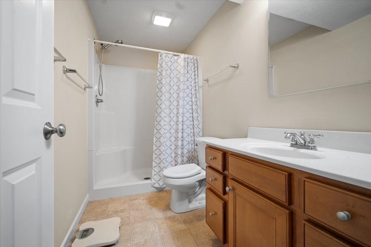 1600 Belclare Road Normal, IL 61761 - Photo 20 of 40 a bathroom with a sink toilet and shower
