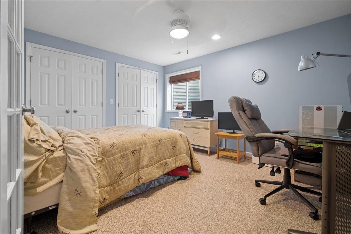 1600 Belclare Road Normal, IL 61761 - Photo 23 of 40 a bedroom with a bed a desk and chair