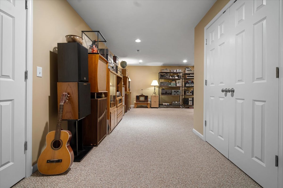 1600 Belclare Road Normal, IL 61761 - Photo 25 of 40 a view of a hallway with closet and a cabinet