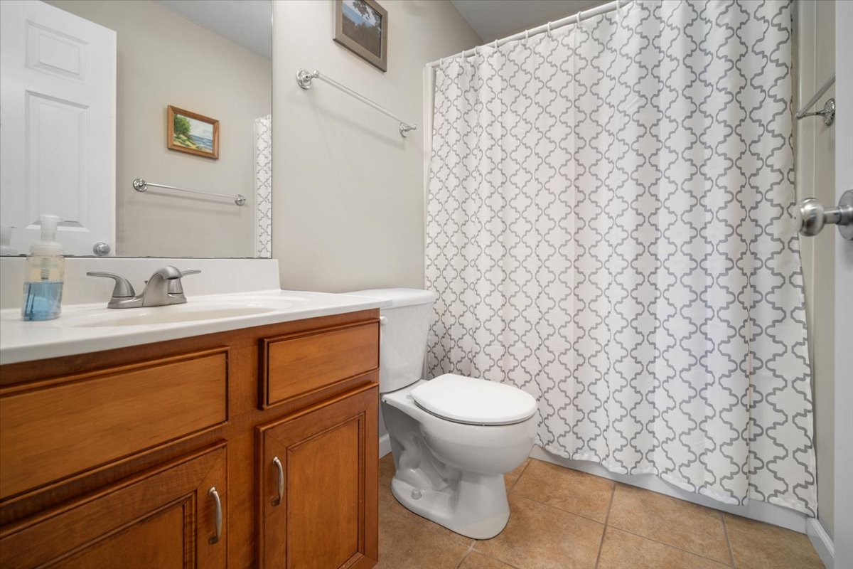 1600 Belclare Road Normal, IL 61761 - Photo 8 of 40 a bathroom with a sink and a toilet