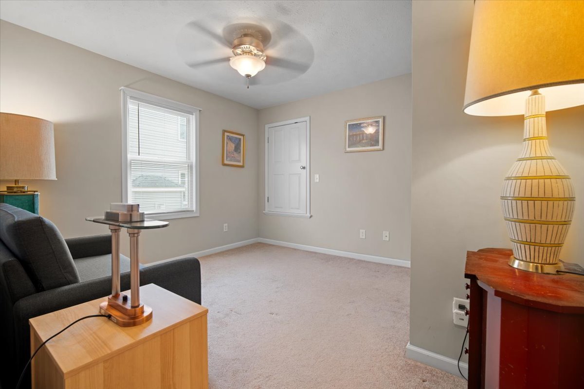 1600 Belclare Road Normal, IL 61761 - Photo 9 of 40 a living room with furniture and a window