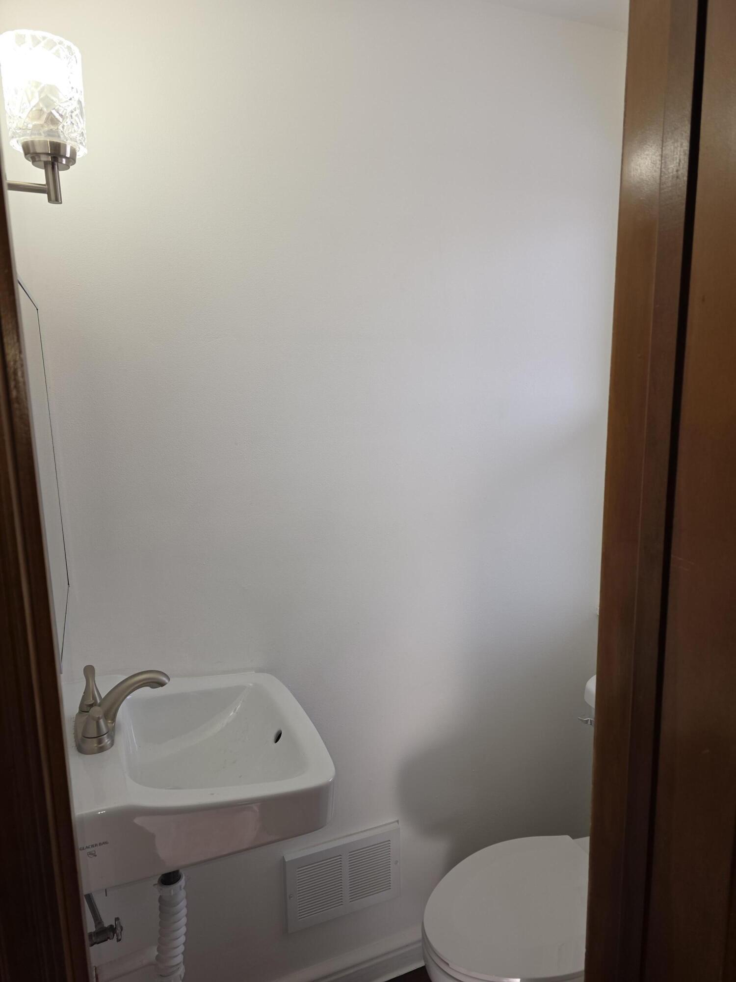 3530 North 55th Street Milwaukee, WI 53216 - Photo 23 of 26 1st floor half bath