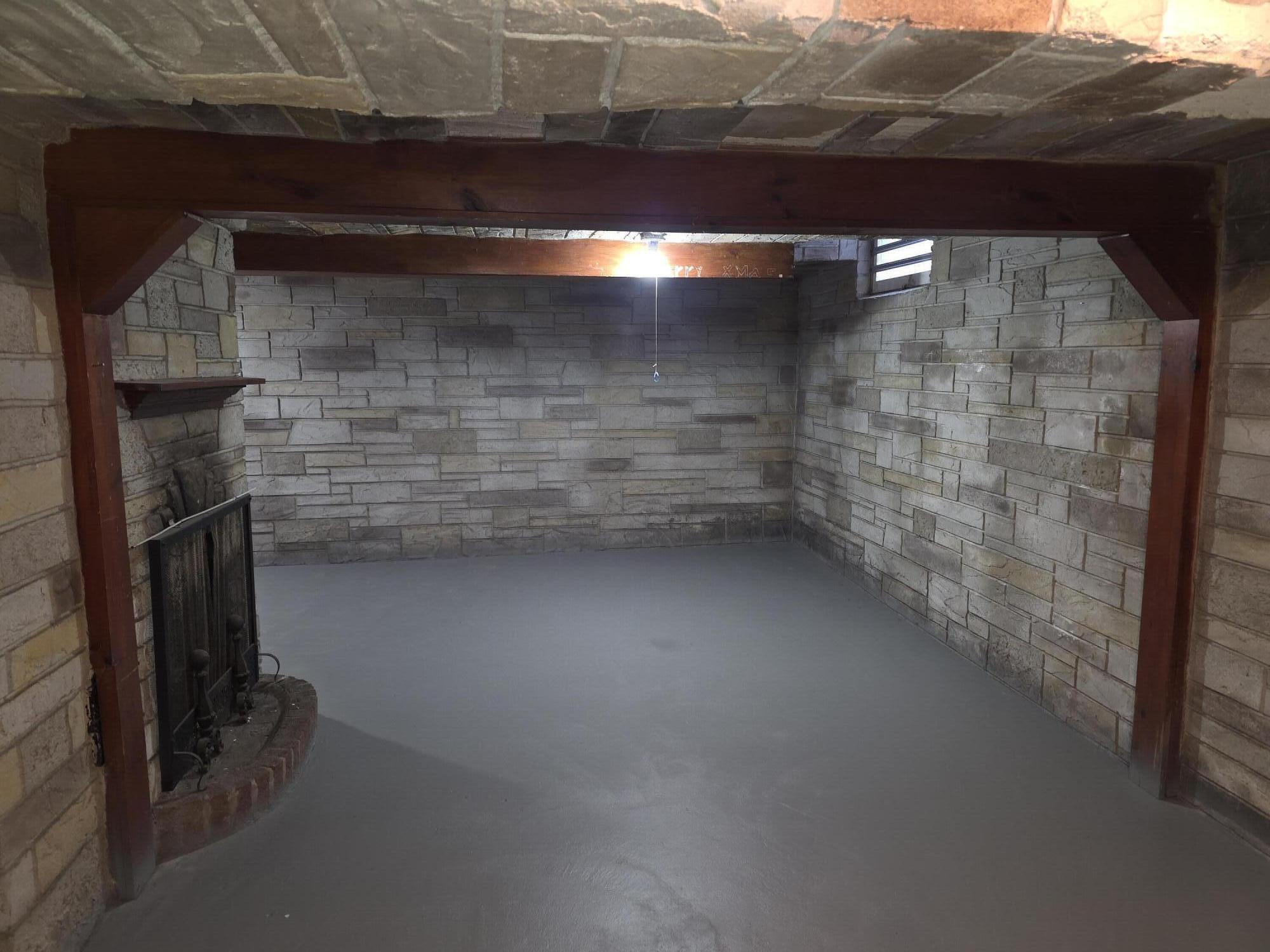 3530 North 55th Street Milwaukee, WI 53216 - Photo 10 of 26 basement bonus room with wood burning fire place