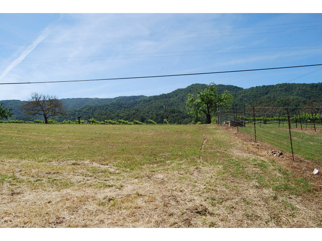 3875 Hecker Pass Road Gilroy, CA 95020 - Photo 4 of 9 a view of a lake with a mountain in the background