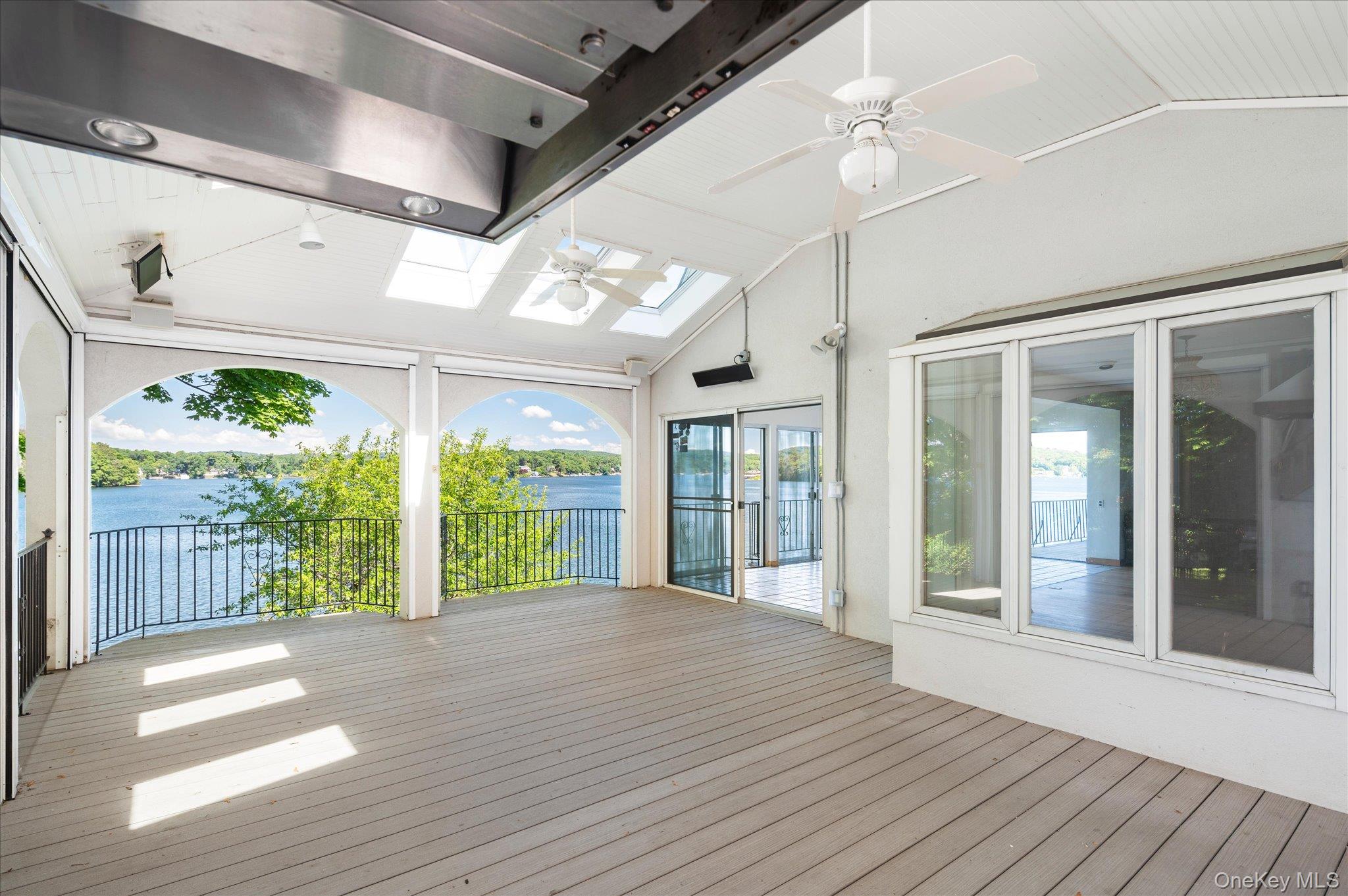 41 Tamarack Road Mahopac, NY 10541 - Photo 21 of 41 Motorized retractable screens disappear at the touch of a button, opening to Lake Mahopac