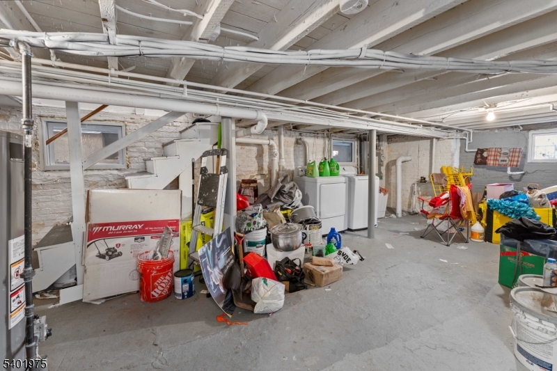 123 Jaques Street Elizabeth, NJ 07201 - Photo 15 of 20 a view of a garage with a bike and car