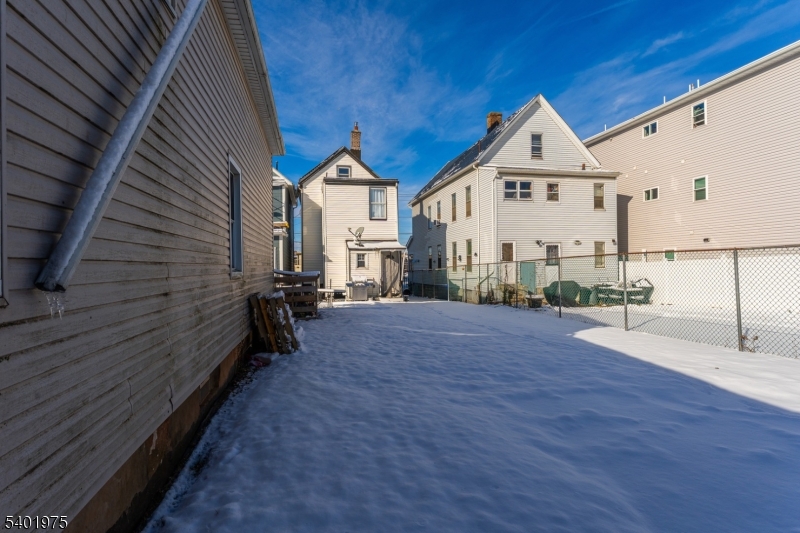 123 Jaques Street Elizabeth, NJ 07201 - Photo 18 of 20 a view of a house with wooden fence