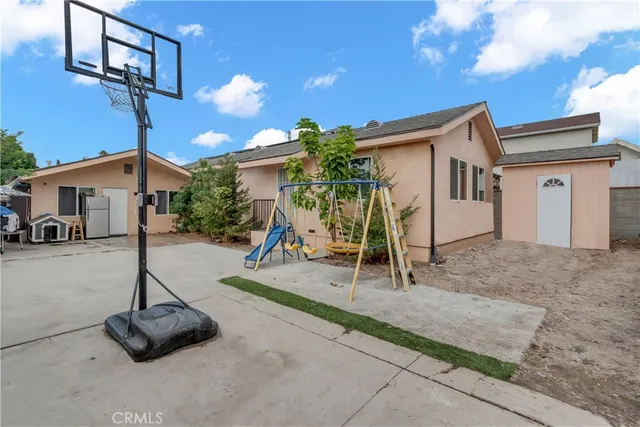 a view of a house with a patio