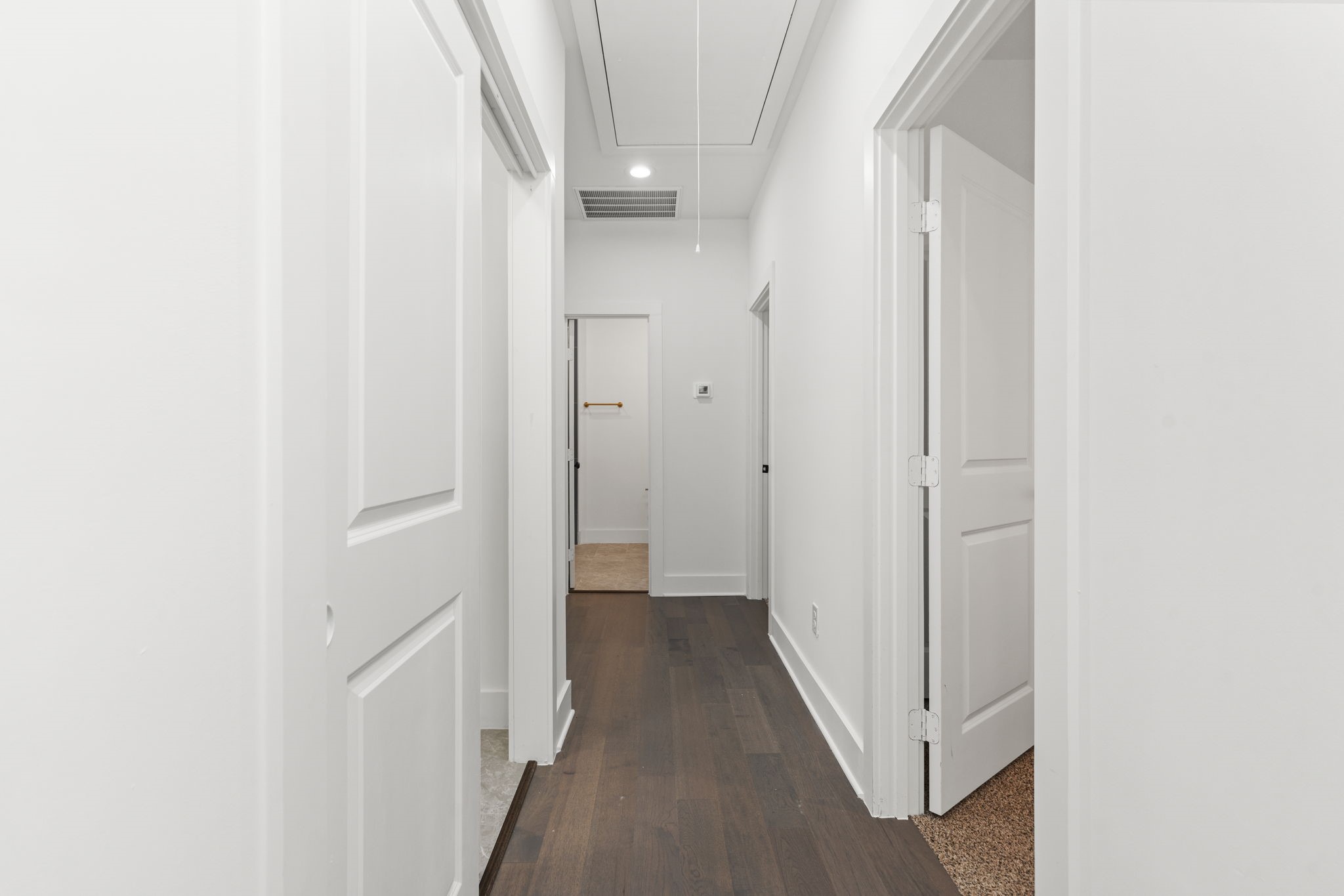 1517 Egypt Street Houston, TX 77009 - Photo 26 of 46 a view of a hallway with wooden floor