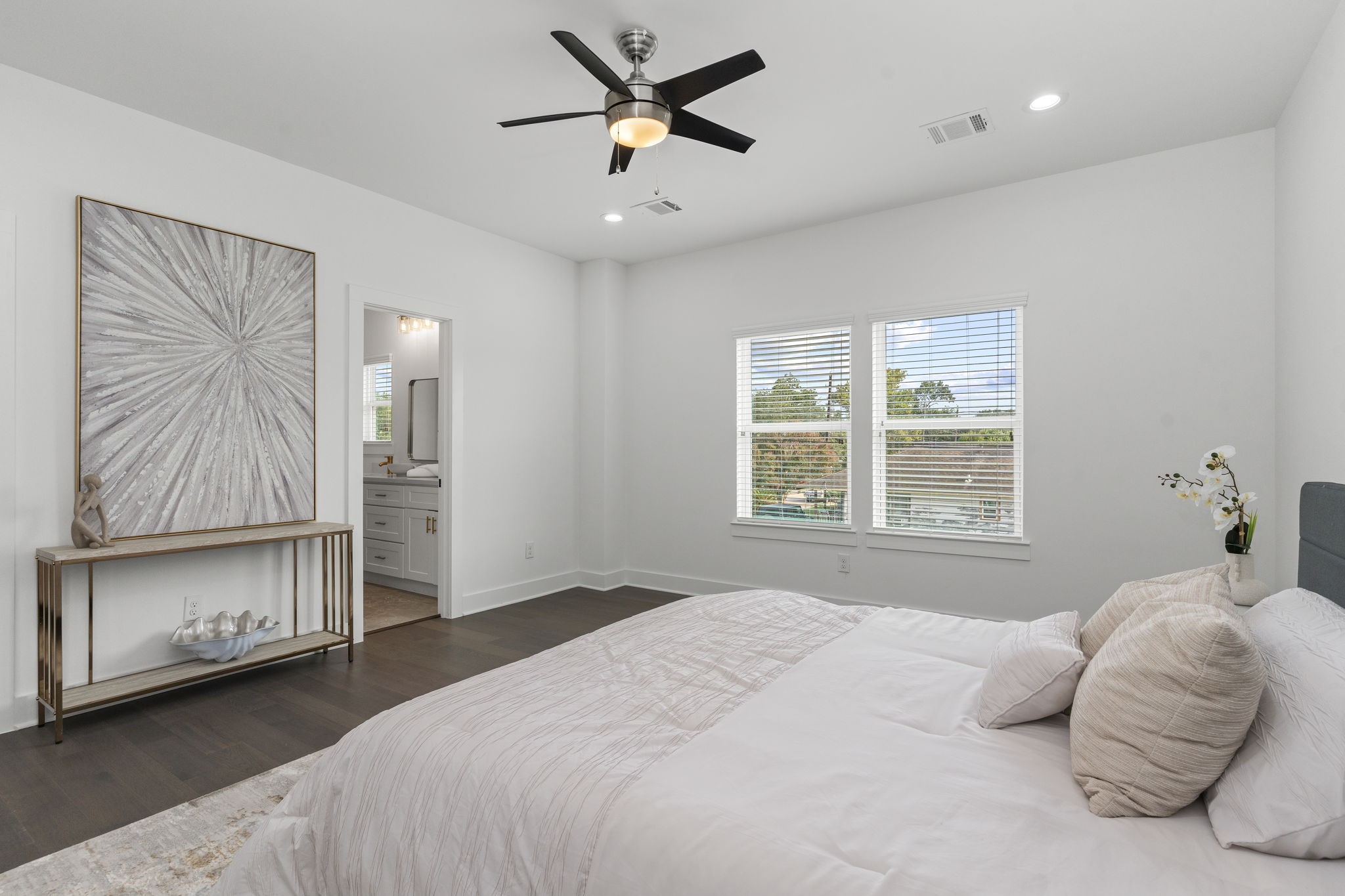 1517 Egypt Street Houston, TX 77009 - Photo 35 of 46 a bedroom with a bed and a ceiling fan