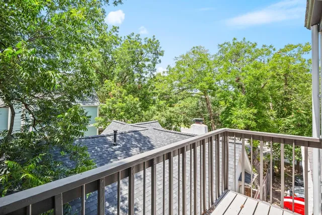a view of a balcony with an outdoor space