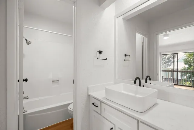 a bathroom with a sink and a tub