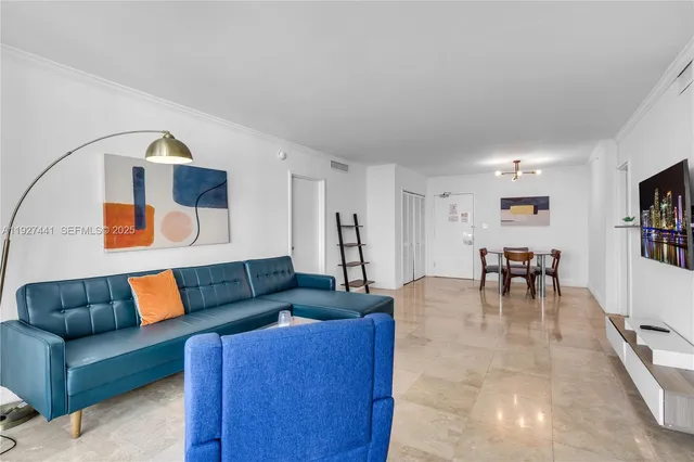 a living room with furniture and a couch