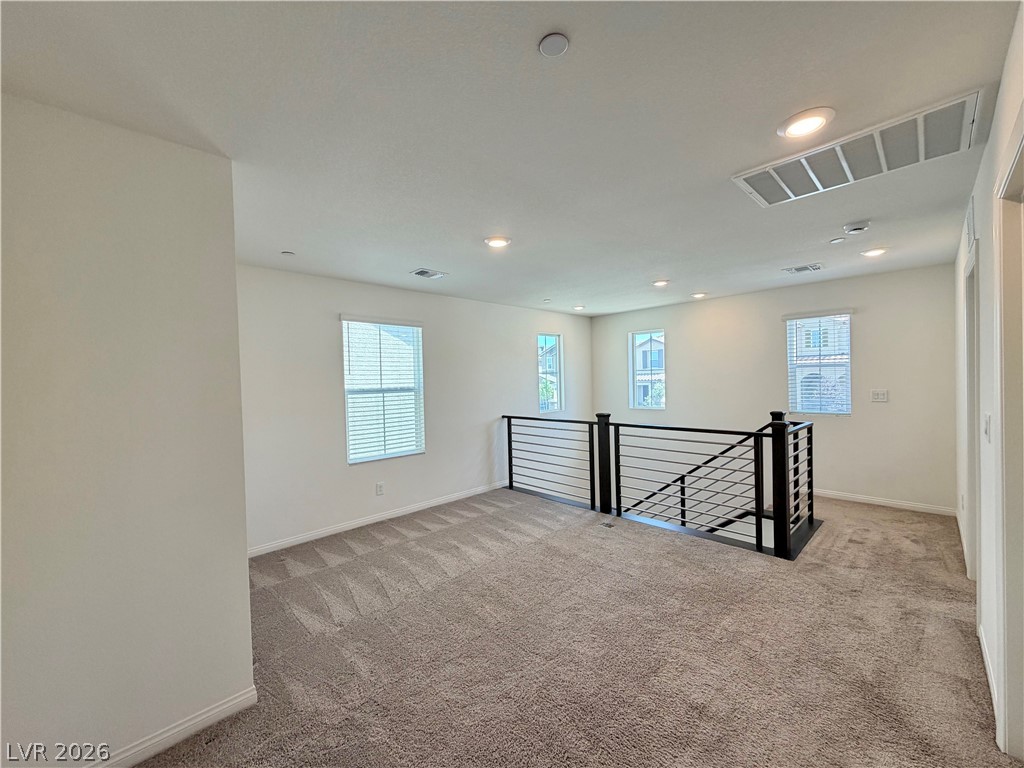 3624 Bitonto Lane Henderson, NV 89044 - Photo 11 of 28 This versatile loft area offers abundant natural light, perfect for a home office or relaxation space.