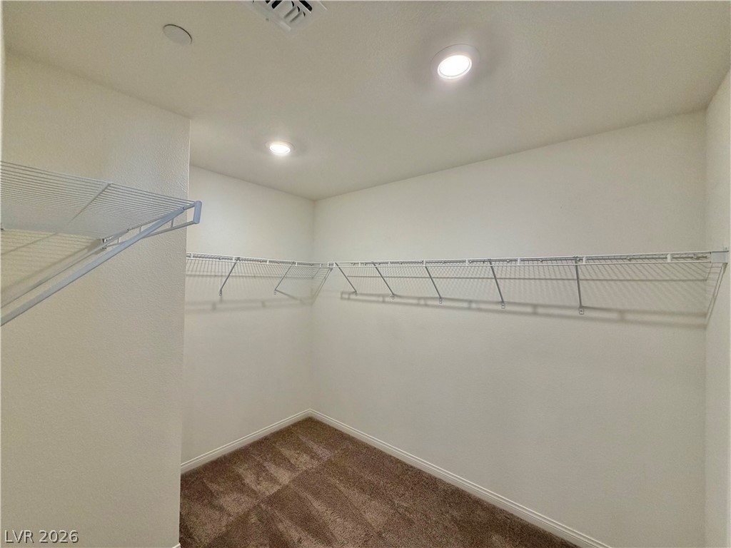 3624 Bitonto Lane Henderson, NV 89044 - Photo 18 of 28 This spacious walk-in closet offers ample storage with convenient wire shelving and recessed lighting.