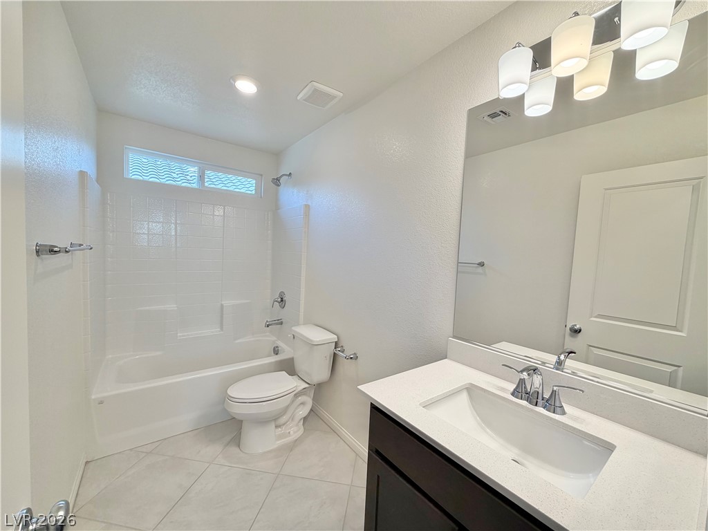 3624 Bitonto Lane Henderson, NV 89044 - Photo 25 of 28 This bathroom features a sleek vanity, modern fixtures, and a bright, functional layout.