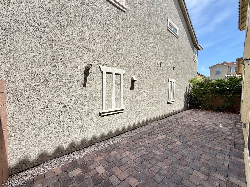 3624 Bitonto Lane Henderson, NV 89044 - Photo 27 of 28 This outdoor space features durable paver flooring, ideal for entertaining or relaxation.