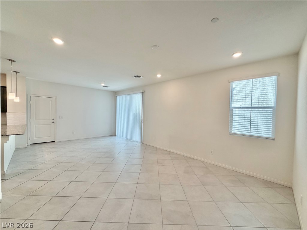 3624 Bitonto Lane Henderson, NV 89044 - Photo 3 of 28 This expansive living space features bright recessed lighting and durable tile flooring throughout.