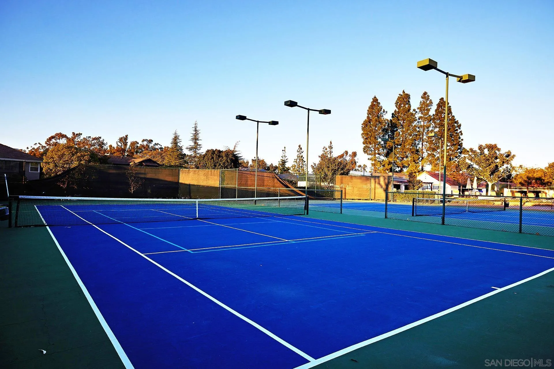 12490 Rue Cheaumont San Diego, CA 92131 - Photo 17 of 58 a view of a tennis court