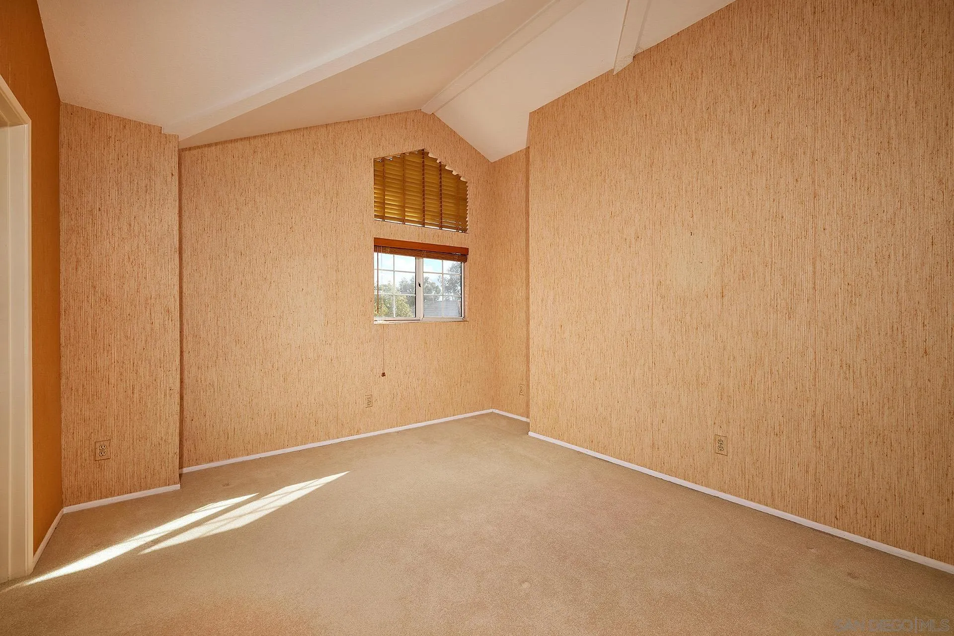 12490 Rue Cheaumont San Diego, CA 92131 - Photo 39 of 58 an empty room with windows