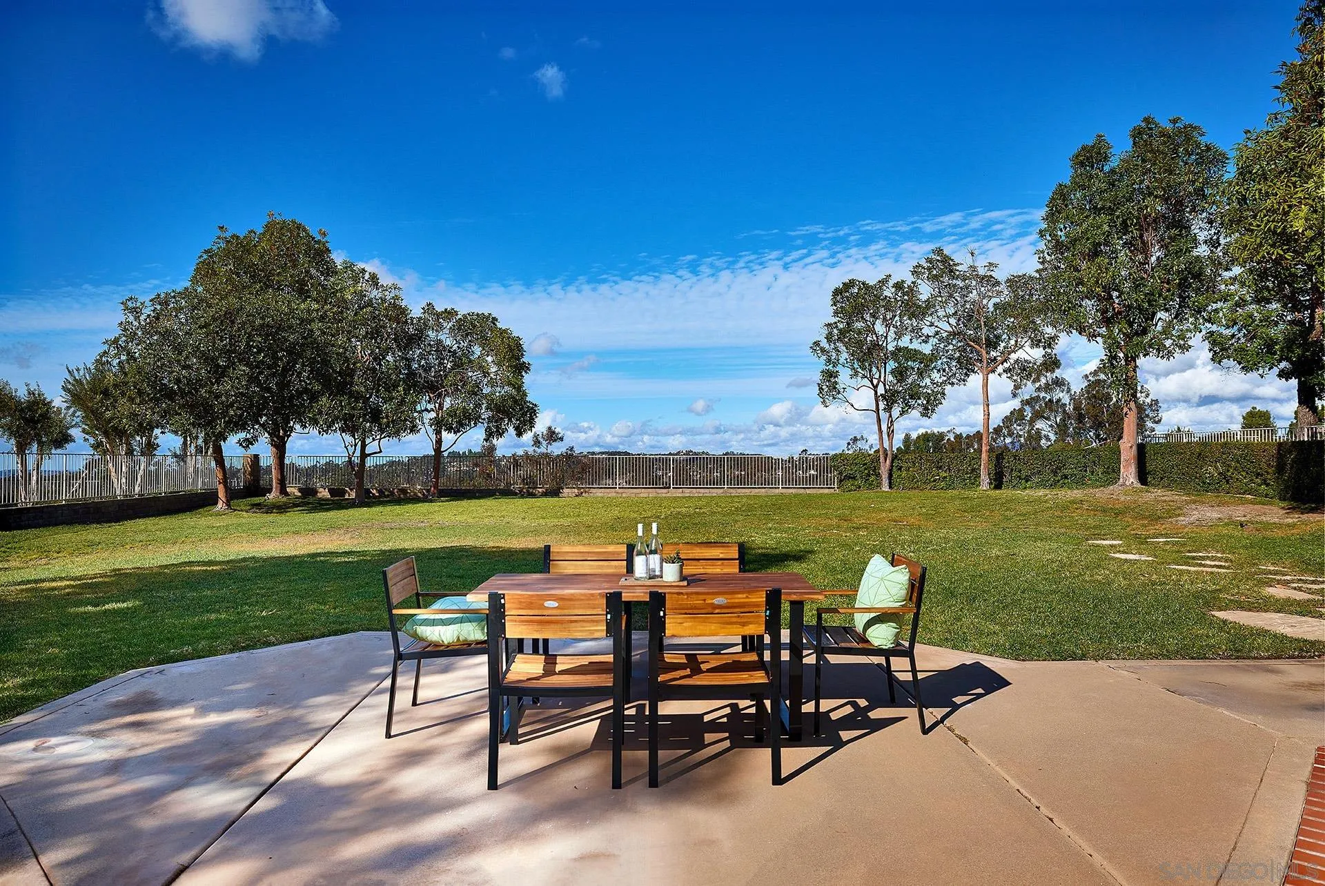 12490 Rue Cheaumont San Diego, CA 92131 - Photo 45 of 58 a view of a swimming pool and outdoor seating