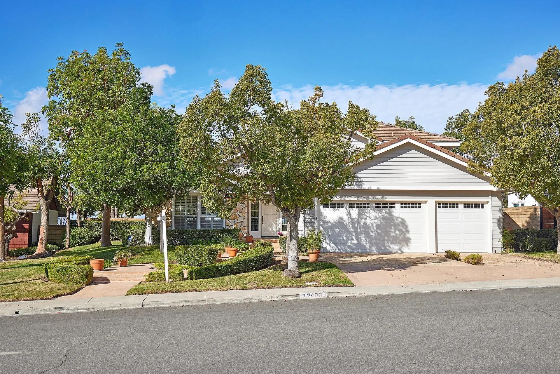 12490 Rue Cheaumont San Diego, CA 92131 - Photo 48 of 58 a view of a house with a outdoor space