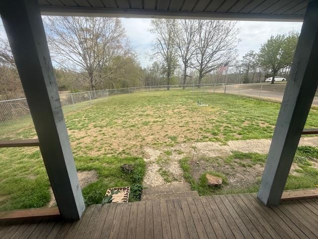 2310 Feddie Davis Road Ramer, TN 38367 - Photo 8 of 38 Fenced backyard with a wooden deck