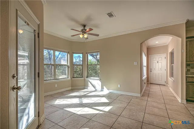 a view of an entryway with a window