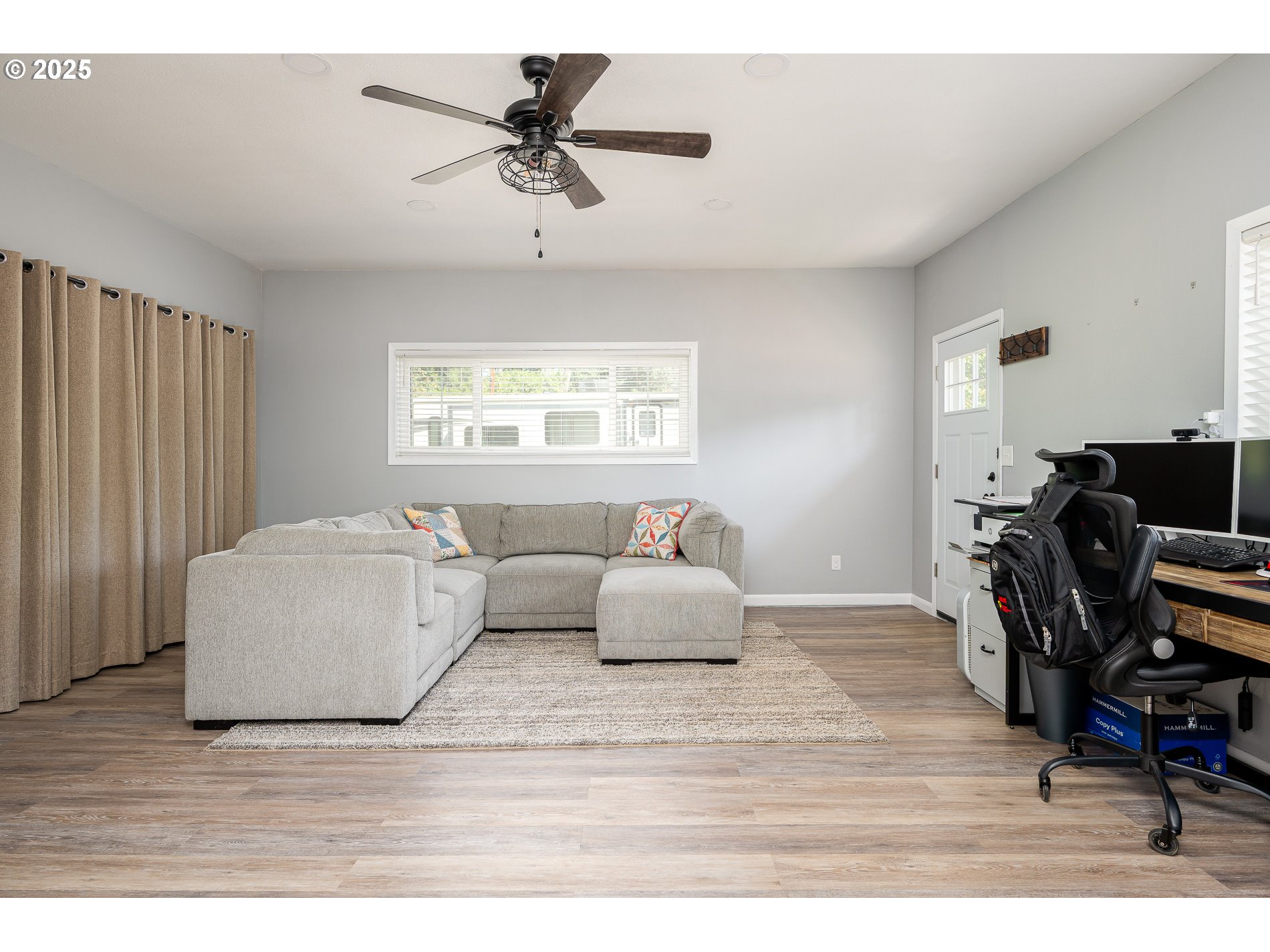 23636 Highway 224 Boring, OR 97009 - Photo 23 of 48 a living room with furniture and a flat screen tv