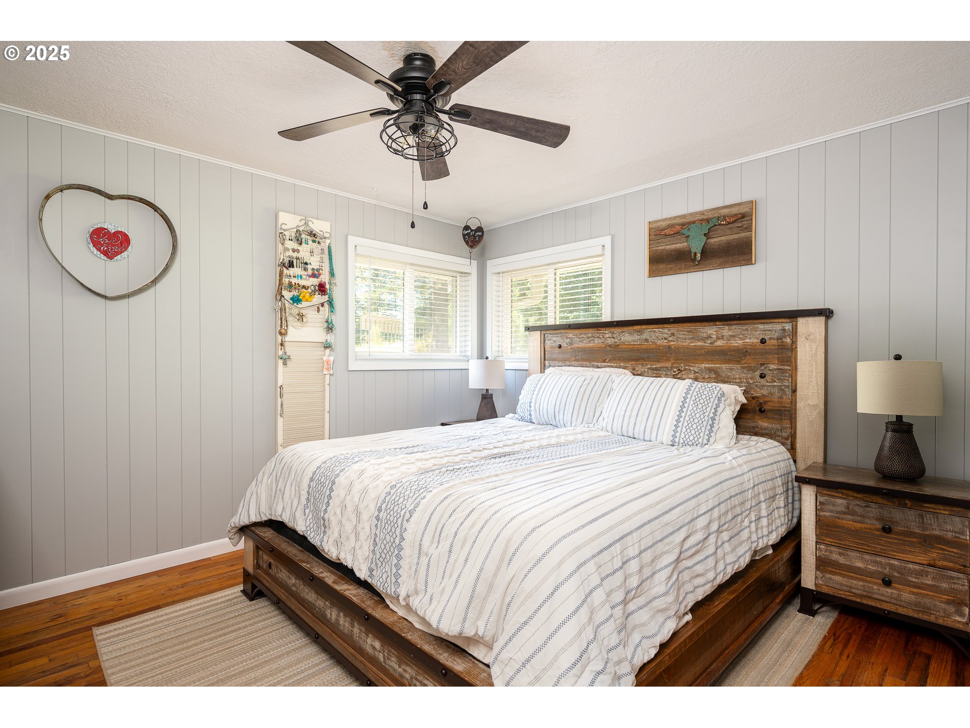 23636 Highway 224 Boring, OR 97009 - Photo 26 of 48 a bedroom with a bed and a chandelier