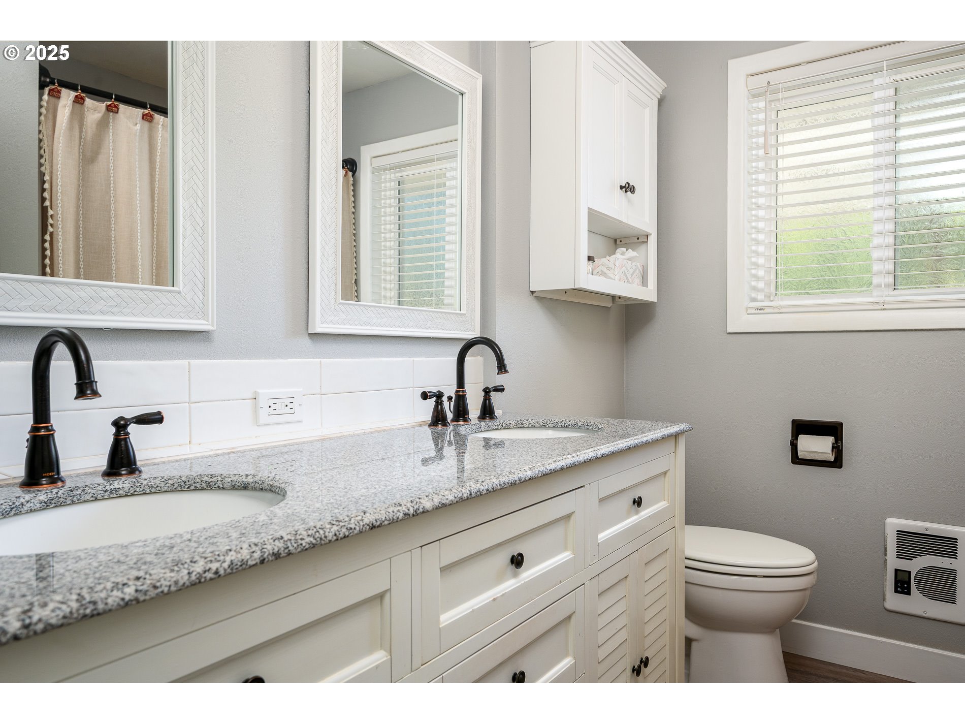 23636 Highway 224 Boring, OR 97009 - Photo 29 of 48 a bathroom with a granite countertop toilet sink and mirror