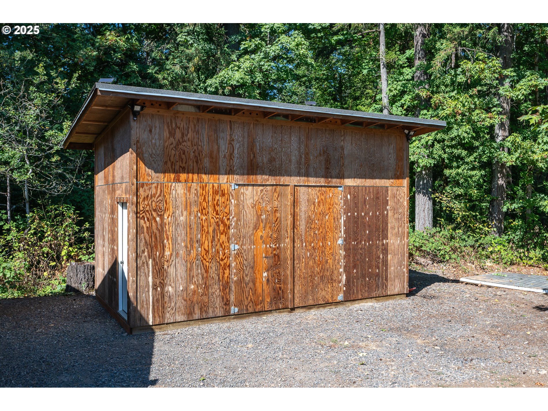 23636 Highway 224 Boring, OR 97009 - Photo 44 of 48 a backyard of a house with large trees and wooden fence