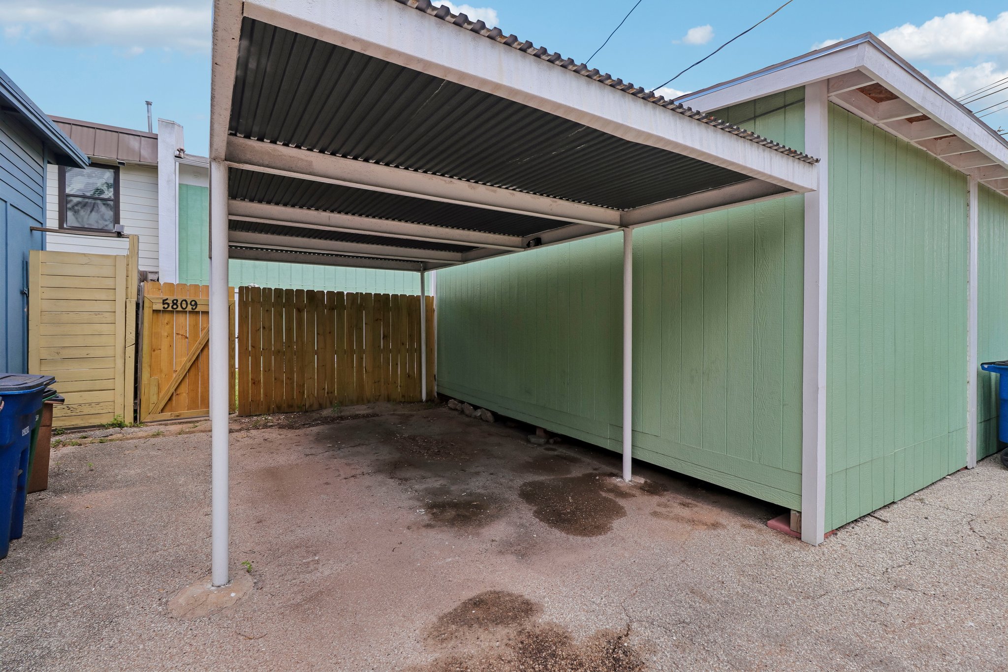 5809 Coventry Lane Austin, TX 78723 - Photo 26 of 35 Designated covered parking with direct access to a private, fenced yard.