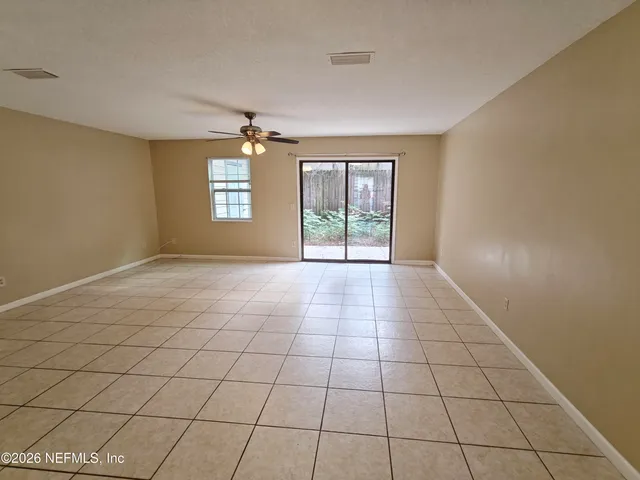 a kitchen with stainless steel appliances granite countertop wooden cabinets and a sink