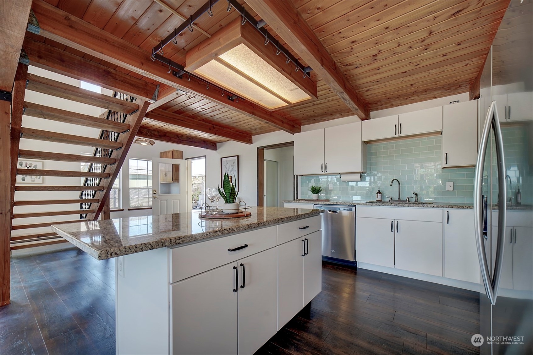 220 East Olympic Drive Grapeview, WA 98546 - Photo 18 of 40 a kitchen that has a lot of white cabinets
