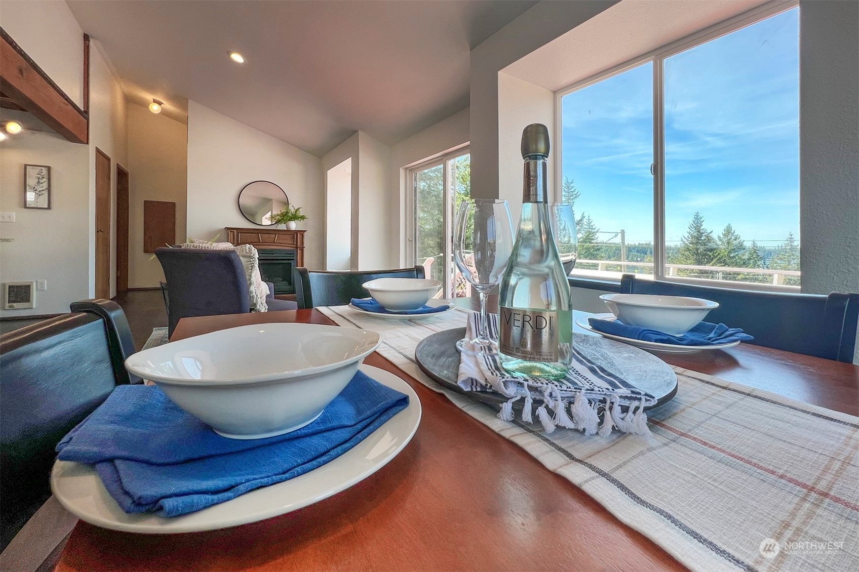 220 East Olympic Drive Grapeview, WA 98546 - Photo 19 of 40 a living room with furniture and a large window