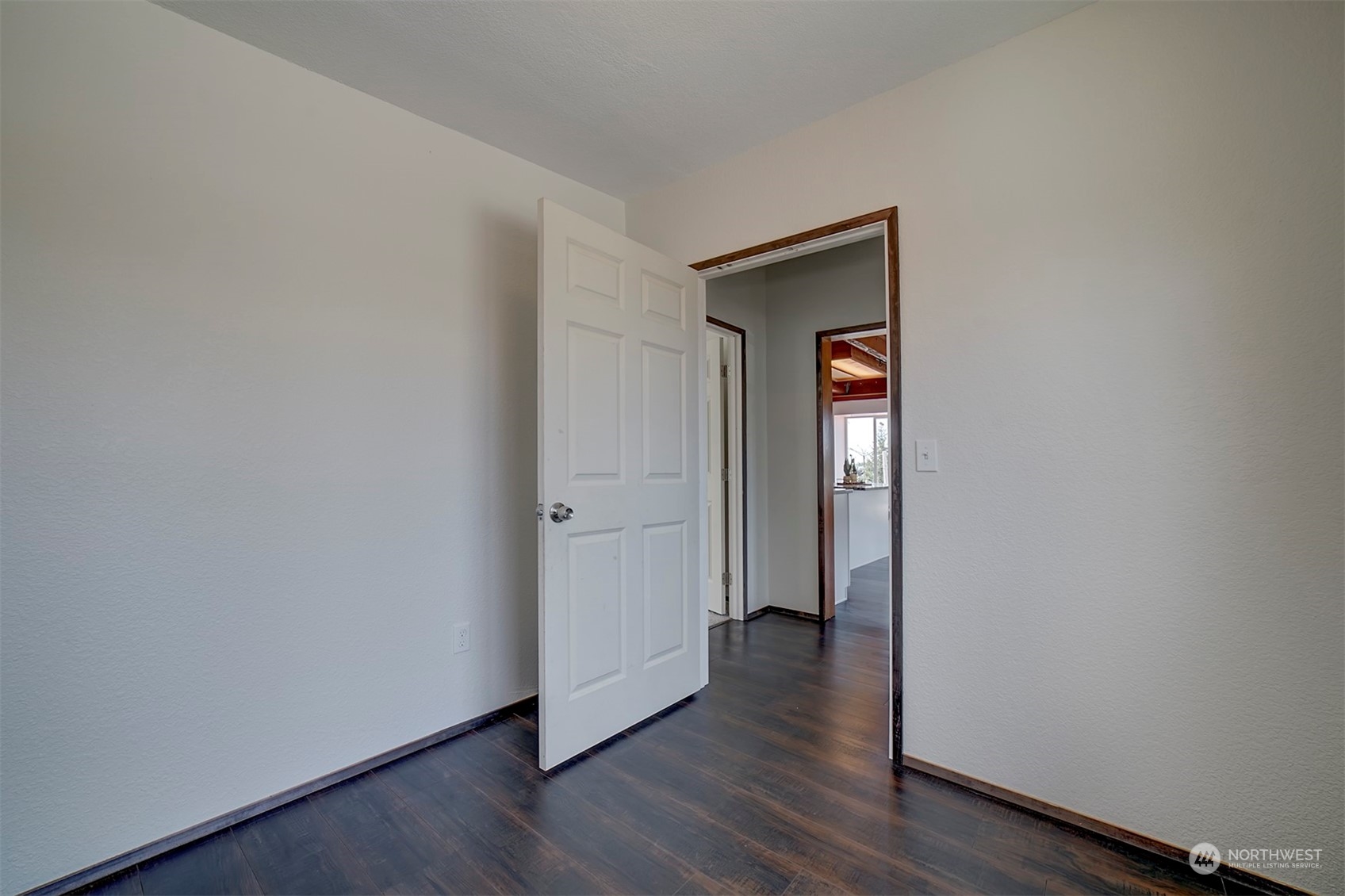 220 East Olympic Drive Grapeview, WA 98546 - Photo 22 of 40 a view of a hallway with wooden floor