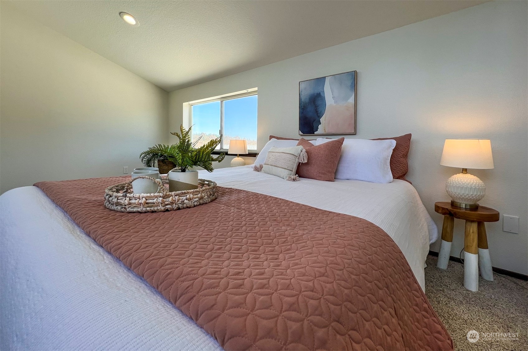 220 East Olympic Drive Grapeview, WA 98546 - Photo 30 of 40 a bed sitting in a bedroom and lamp