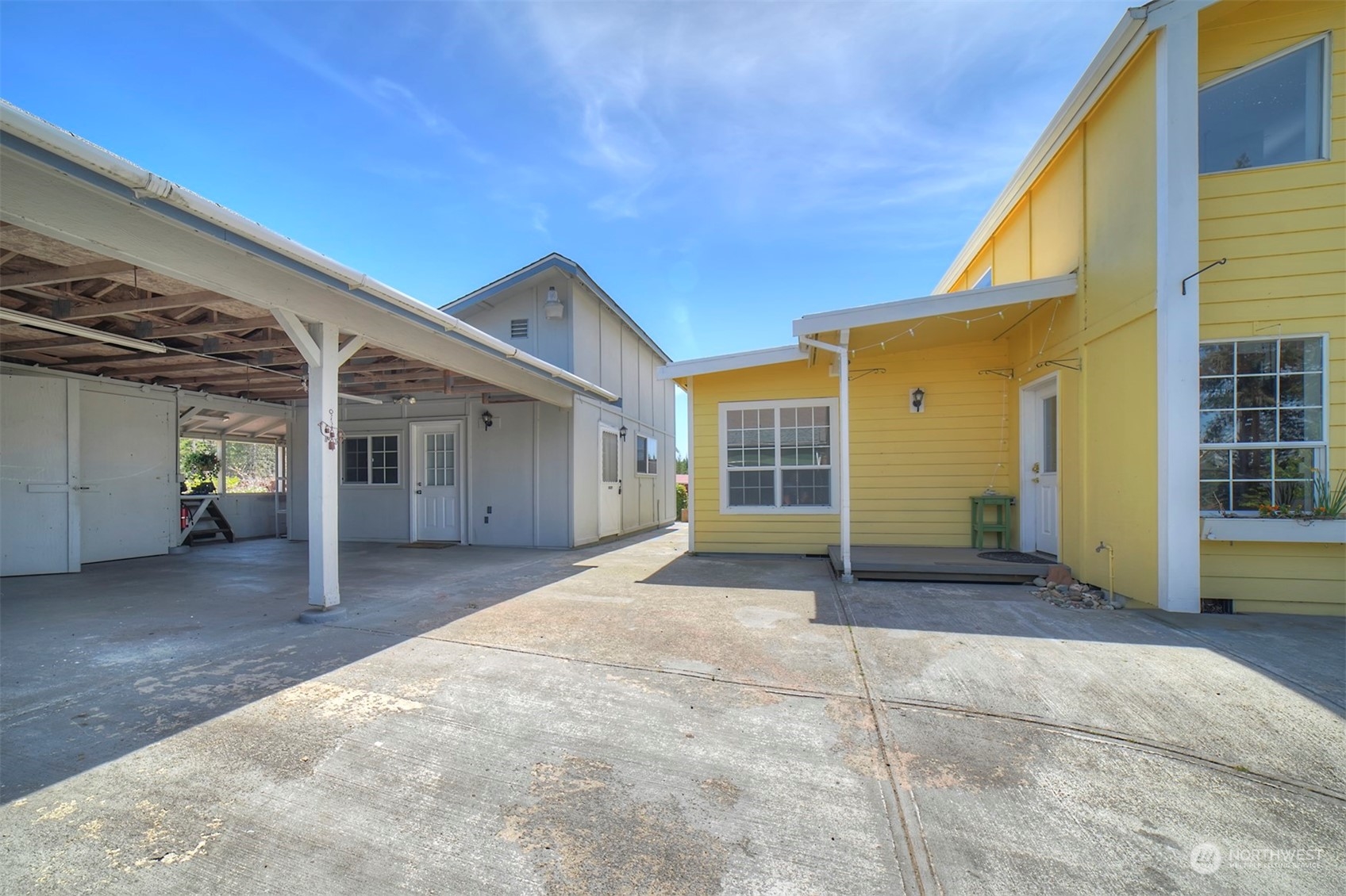 220 East Olympic Drive Grapeview, WA 98546 - Photo 37 of 40 a view of a house with a outdoor space
