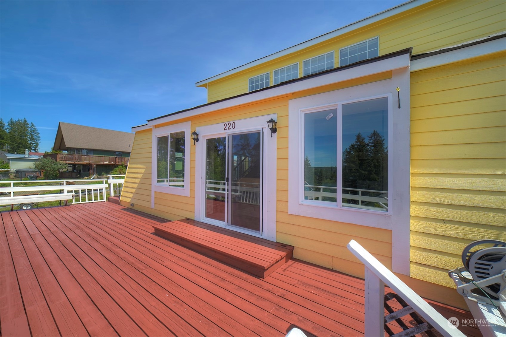 220 East Olympic Drive Grapeview, WA 98546 - Photo 38 of 40 a view of a house with wooden floor